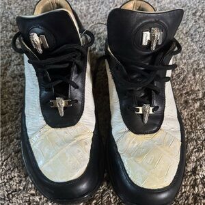 Mauri’s alligator sneakers.  With original box.